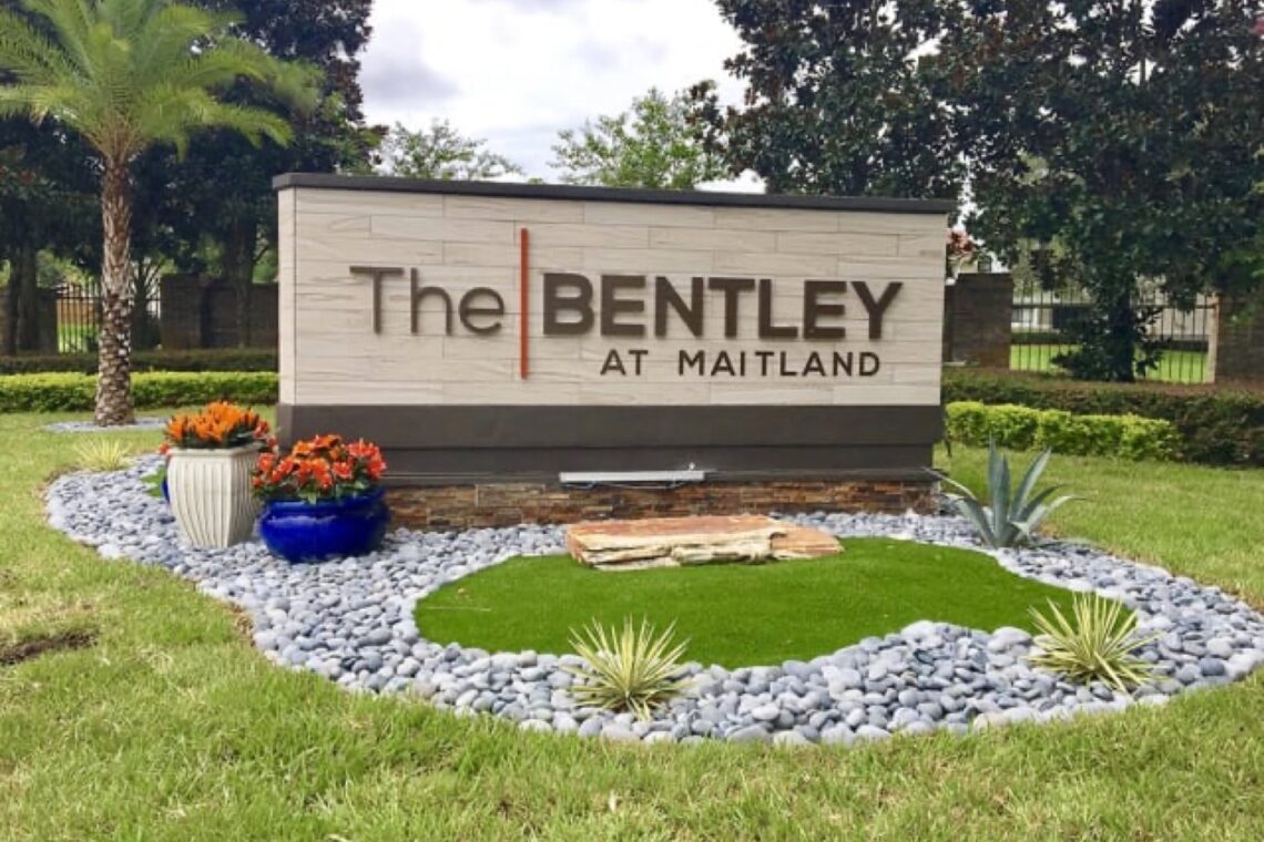 investing in apartment complexes Bentley Monument Sign